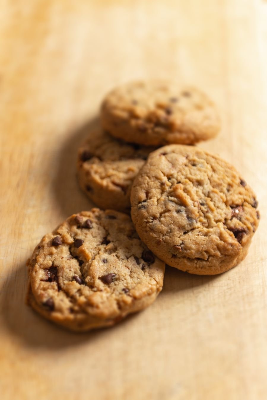 Chocolate chip cookies on a wooden board